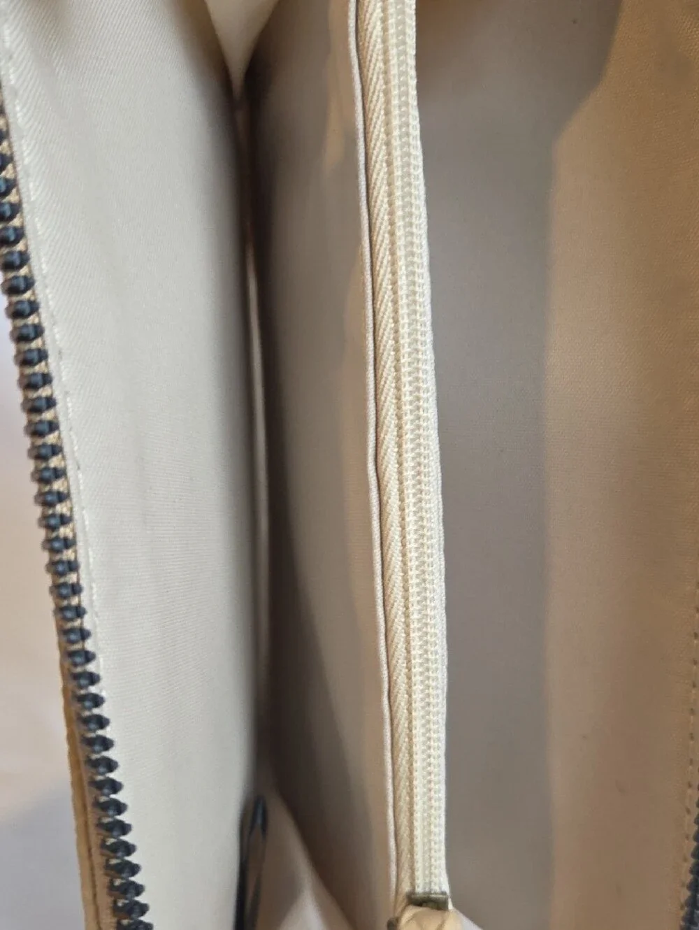 Safe Keeper Beige Textured Woven Zip Around Wristlet Wallet.